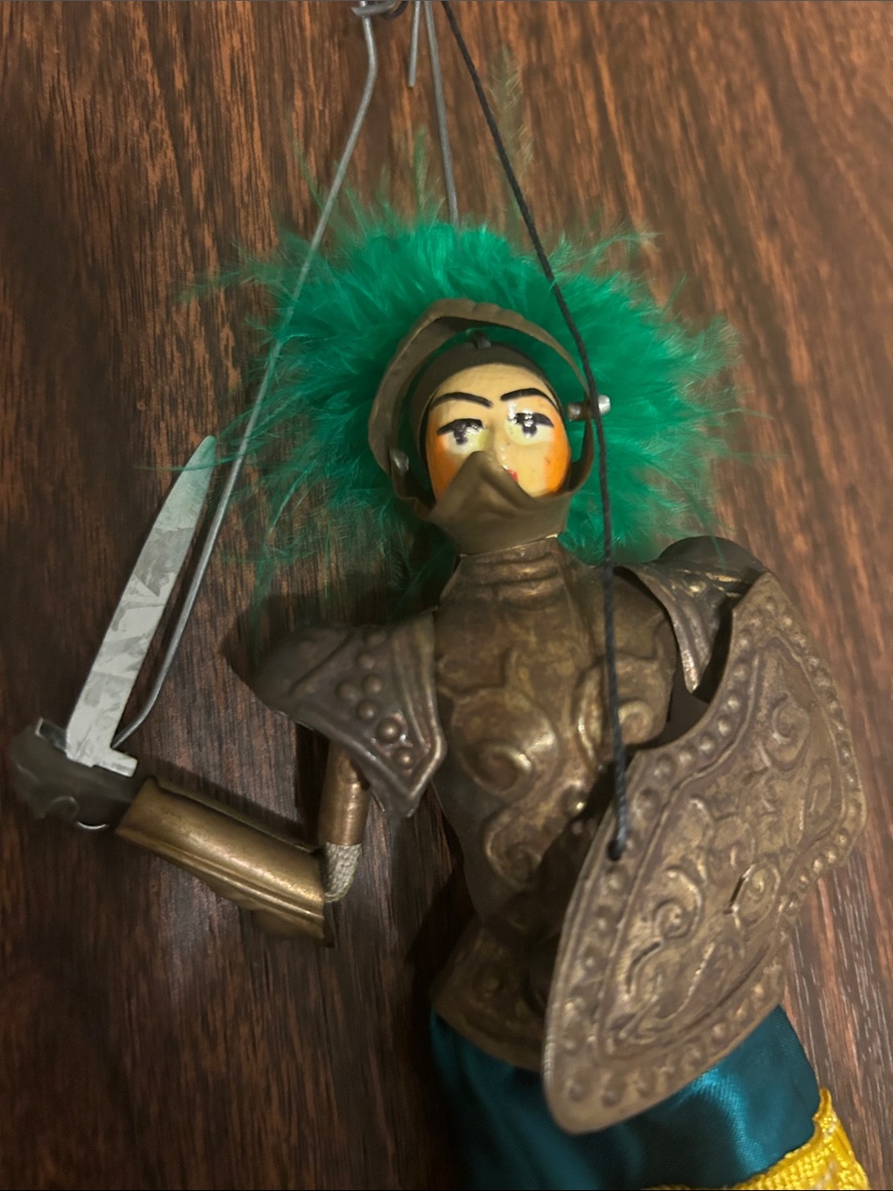 Vintage Italian Ronaldo Knight puppet with metal armor and sword.